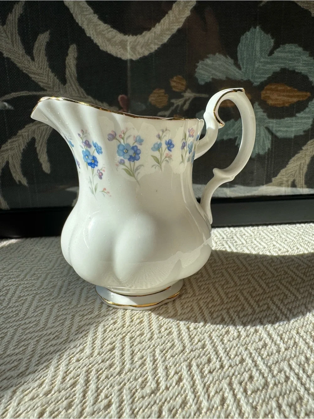 Royal Albert White Porcelain Creamer with Blue Floral Motif and Gold Trim